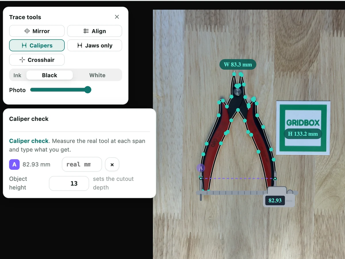 Gridbox Pro's Caliper check: a span across the wire cutters handles pinned as A, reading 83.28 mm, with a box to type what your real calipers read