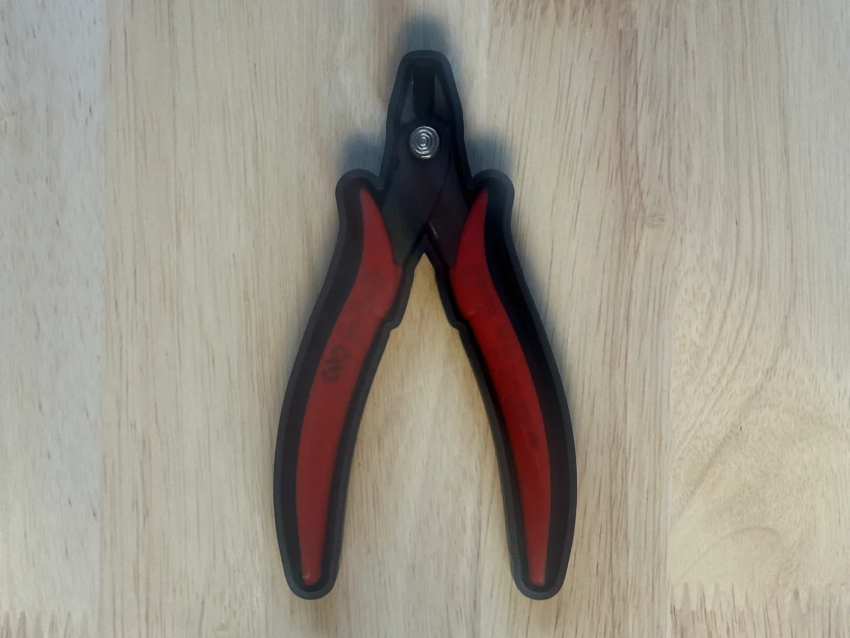 The wire cutters sitting in their thin ShadowFit test piece, with an even gap all the way around