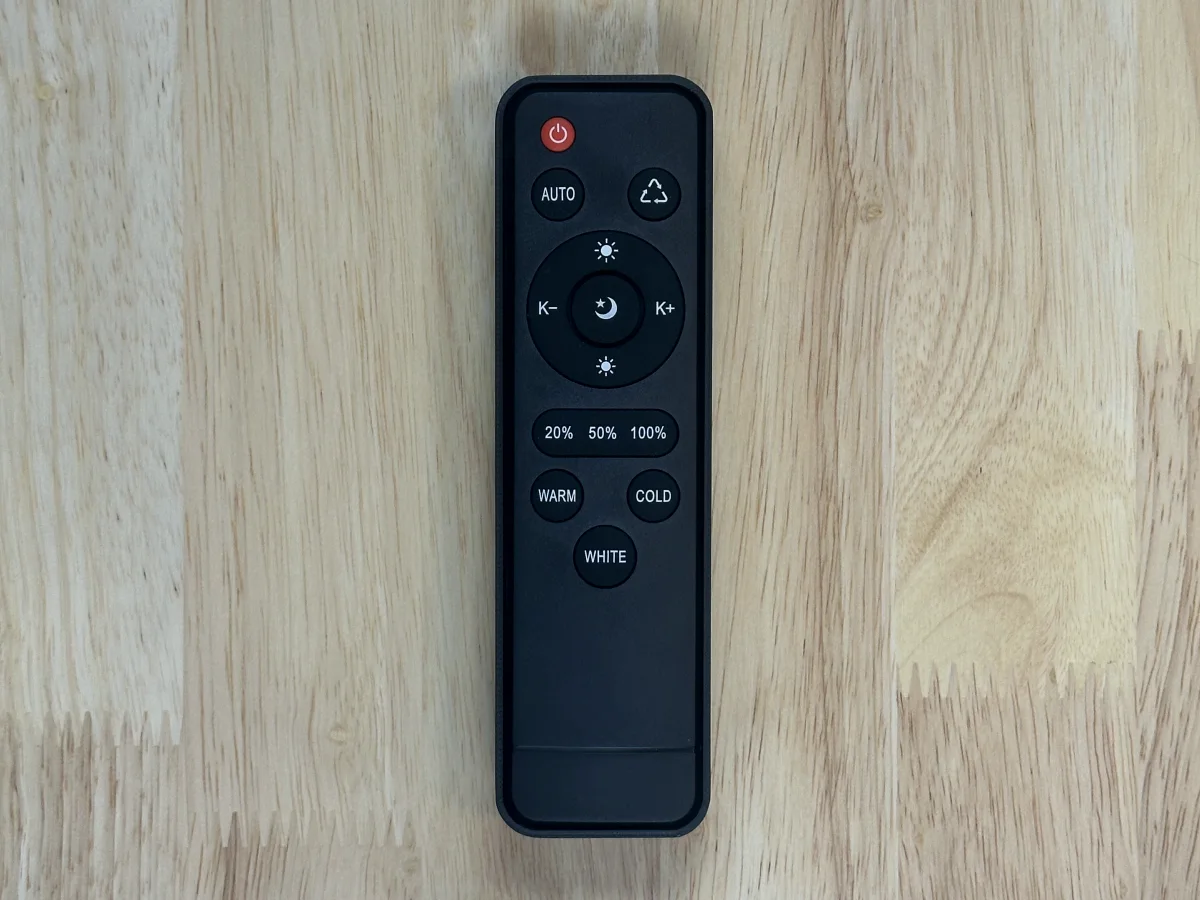 The light remote sitting in its ShadowFit test piece